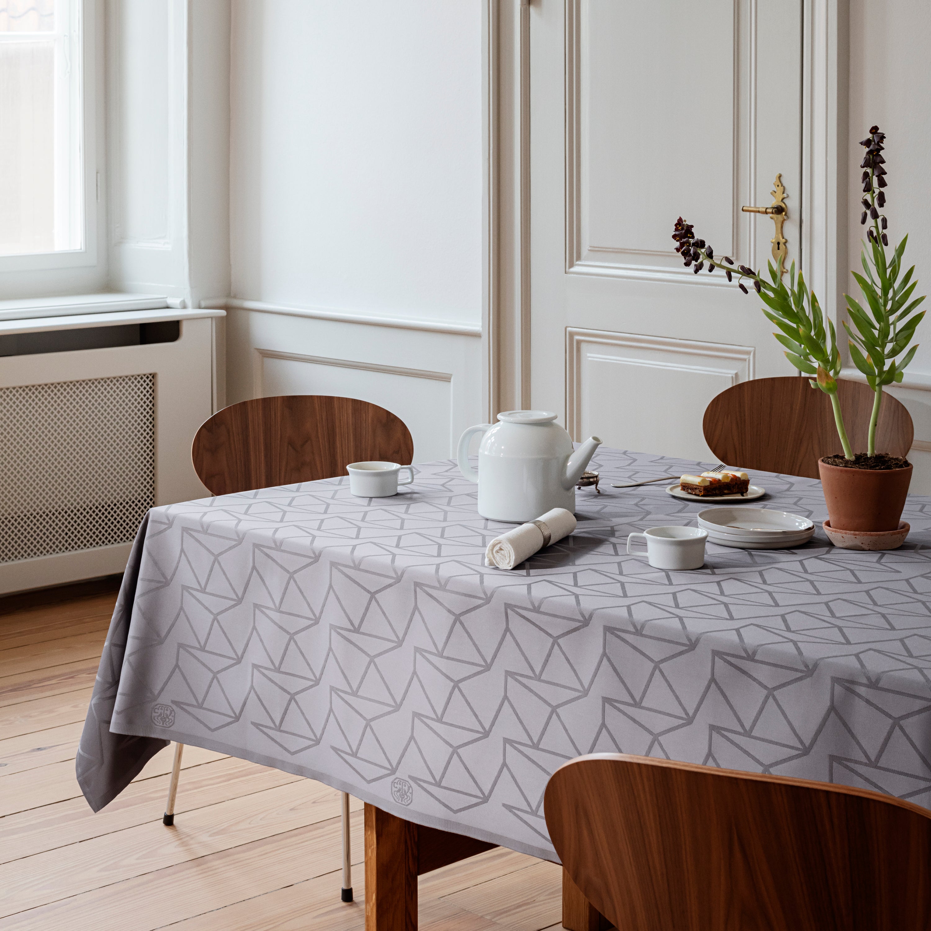 Grey damask-woven Arne Jacobsen tablecloth