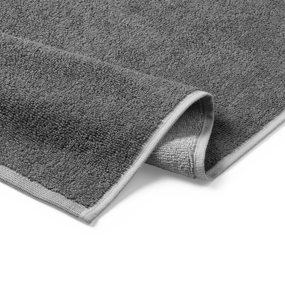 Bath towel with a X